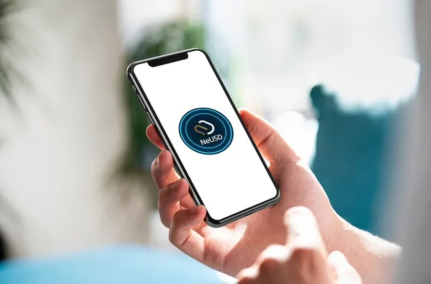 NeUSDのロゴとスマートフォン